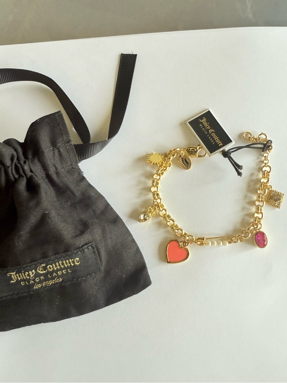 Juicy Couture Black Label Gold Tone Heart Charm Bracelet Pink Coral Accents NWT